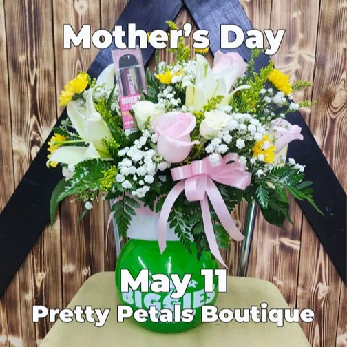 BUT DID YOU DIE? Despite every corrective house slipper thrown, wooden spoon applied, and whatever Mom had handy, you turned out alright. Ok, there's the one tiny scar right along your hairline from that time she threw a high heel, but it is barely noticeable. So, don't forget Mom on her special day, or you may be ducking and running once again. This message was brought to us by an expert -- YOUR MOTHER! Call 575-842-9183 for Pretty Petals Boutique.